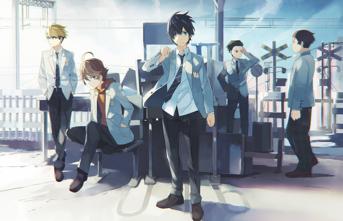 Group of boys in school uniforms at a train station