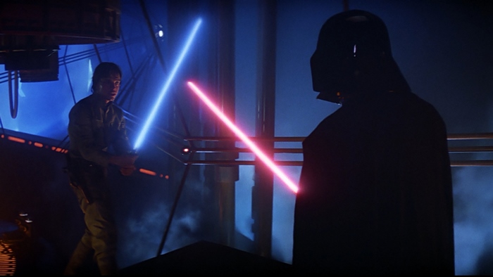 Luke Skywalker and Darth Vader duel with lightsabers