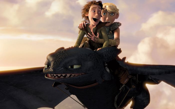 Hiccup and Astrid riding Toothless from How to Train Your Dragon