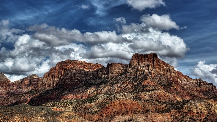 Desert mountains under a cloudy sky