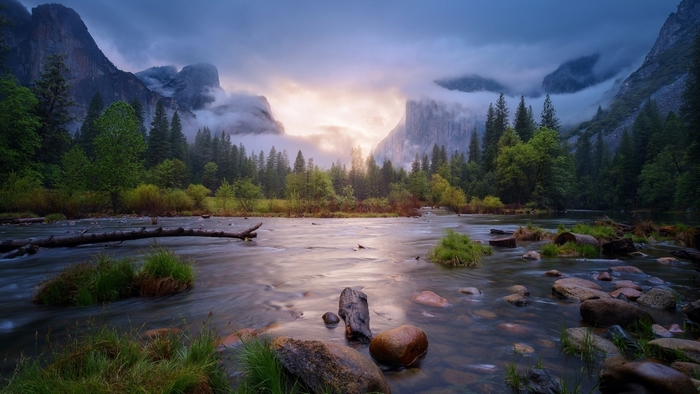 Serene Mountain River with Forest and Clouds