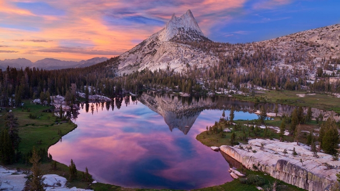 Cathedral Peak reflected in a lake at sunset, Yosemite