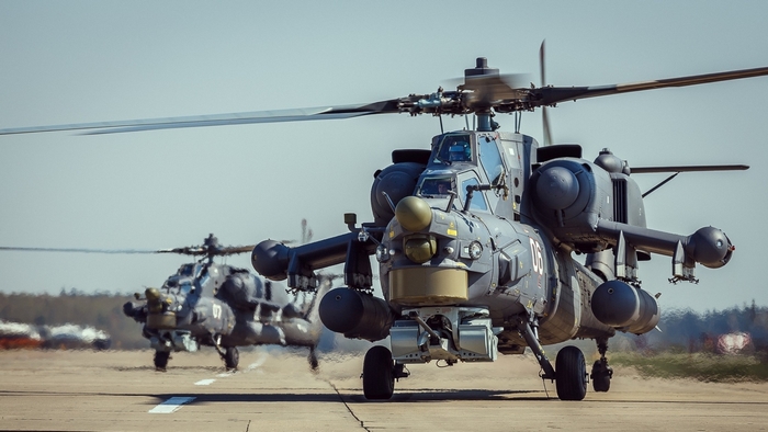 Two Mi-28 Havoc attack helicopters on a runway