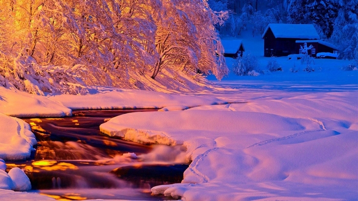 Winter Sunset by Snow-Covered River and Cabin