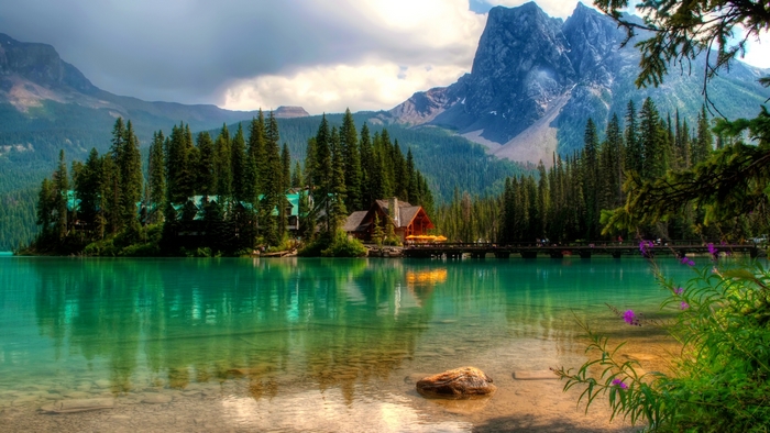 Emerald Lake with Mountains and Forest Lodge