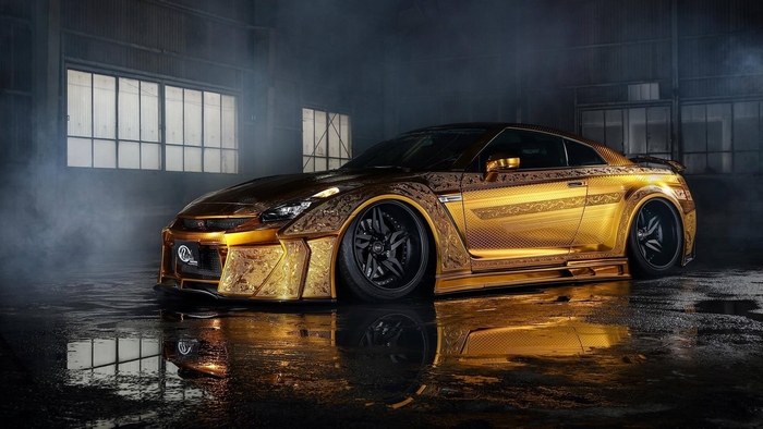 Gold Engraved Nissan GTR in Dark Garage