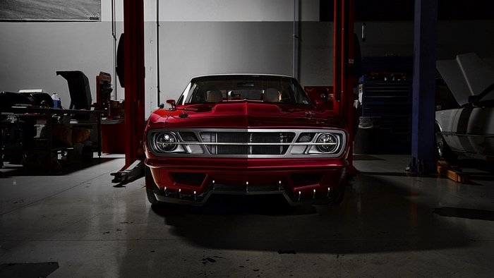 Red custom car in a garage