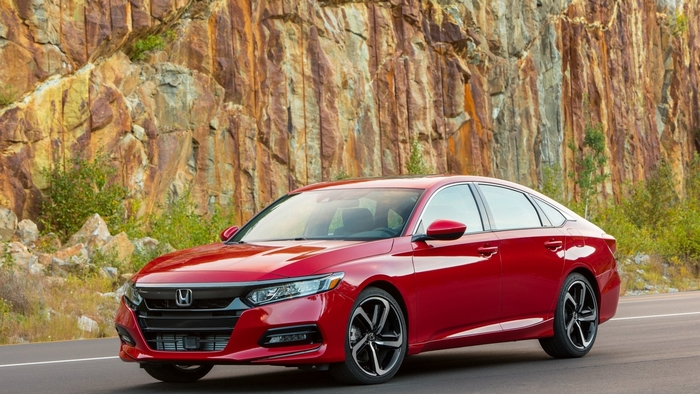 Red Honda Accord Sedan on a Road