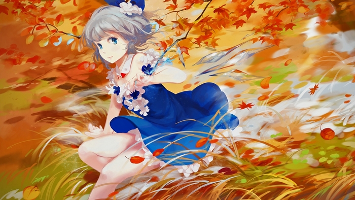 Girl in blue dress in autumn forest