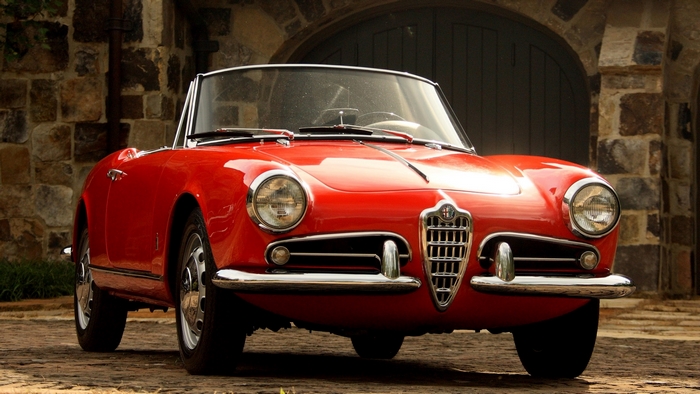 Red Alfa Romeo Giulietta Spider convertible sports car
