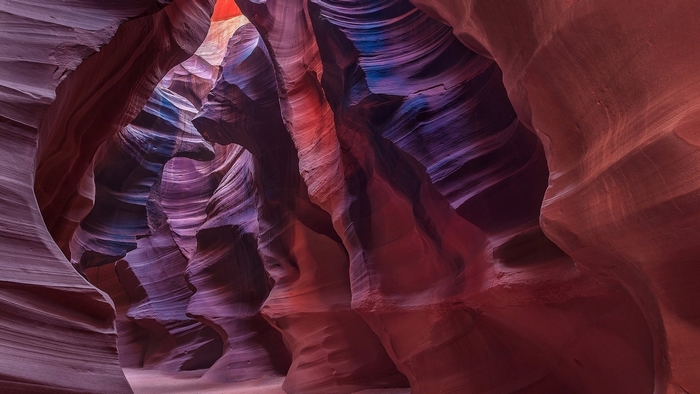 Antelope Canyon sandstone formations with colorful light