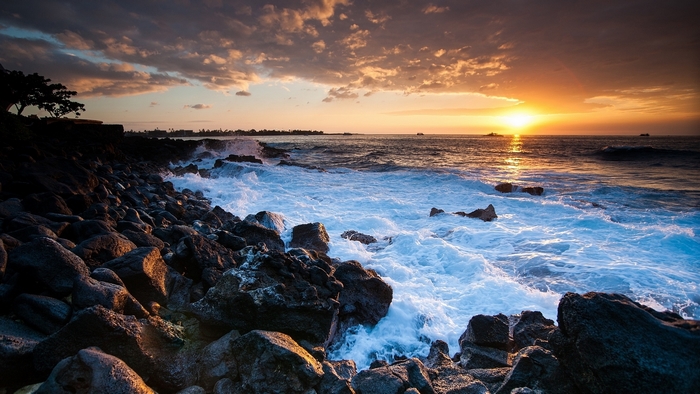 Sunset Over Rocky Ocean Coast