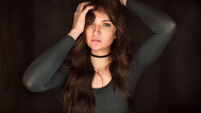 Amanda Trimble posing with hands in hair