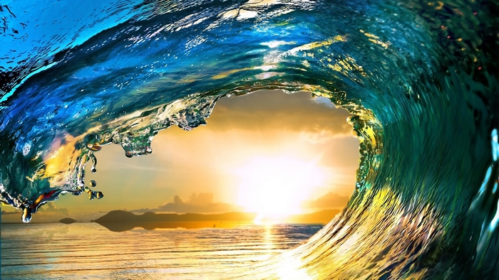Sunrise Through a Curling Ocean Wave