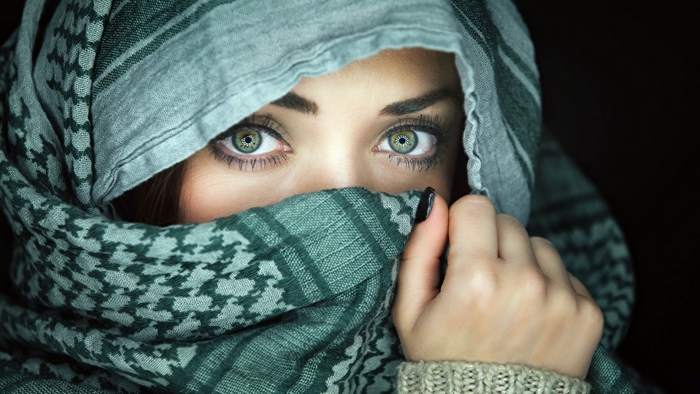 Mysterious Woman with Striking Green Eyes