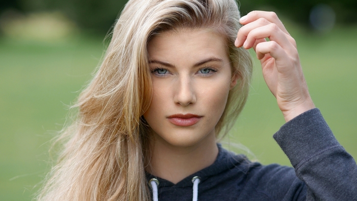 Beautiful Blonde Woman with Intense Blue Eyes