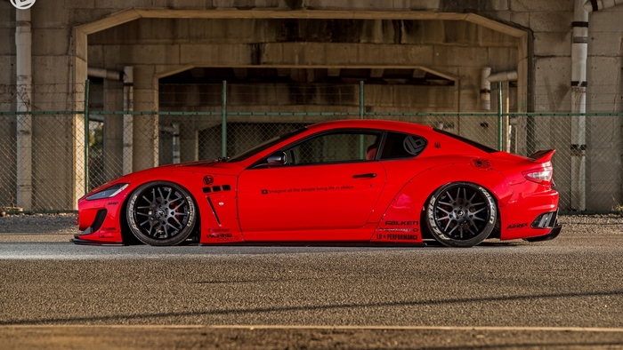 Red Maserati Gran Turismo with custom body kit
