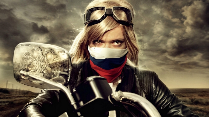 Woman with Russian flag bandana on motorcycle