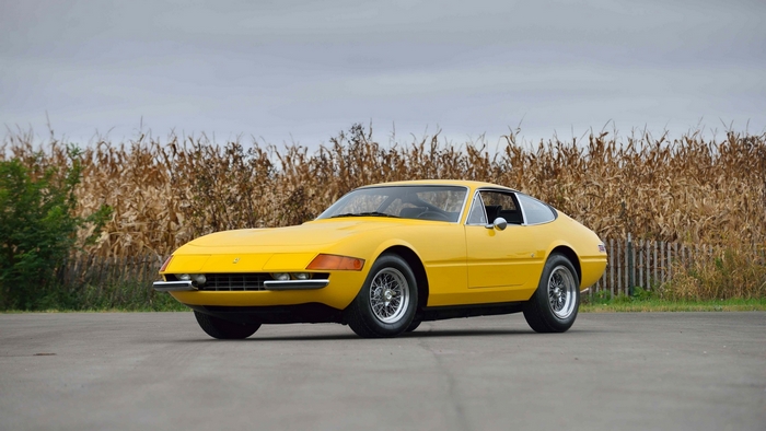 Yellow Ferrari Daytona parked outdoors
