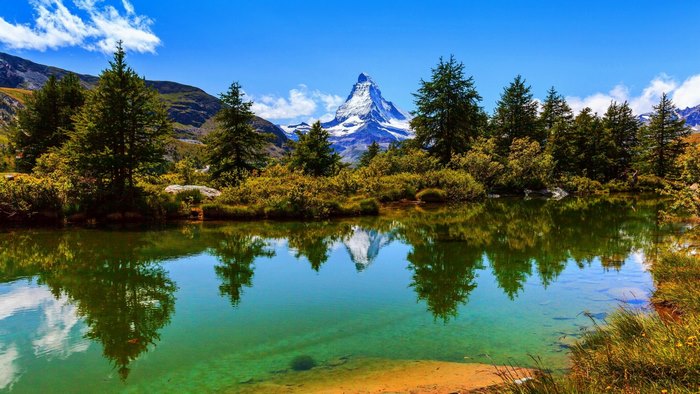 Matterhorn mountain reflected in a lake in Switzerland