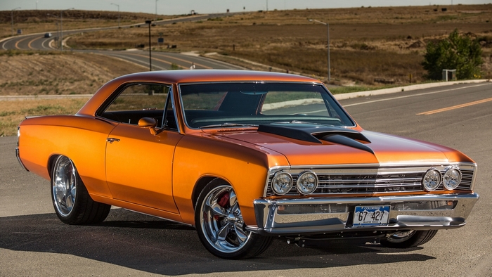 Orange 1967 Chevrolet Chevelle SS parked on a road
