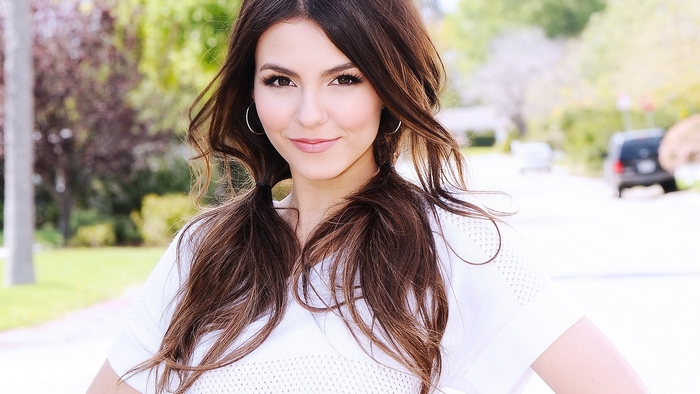 Victoria Justice posing outdoors
