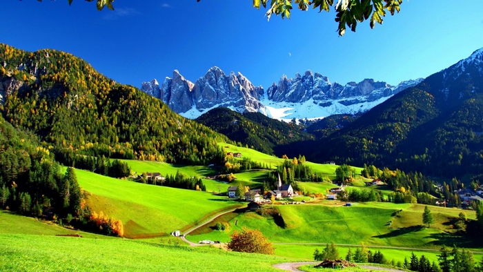 Scenic Italian Alps Valley with Green Meadows