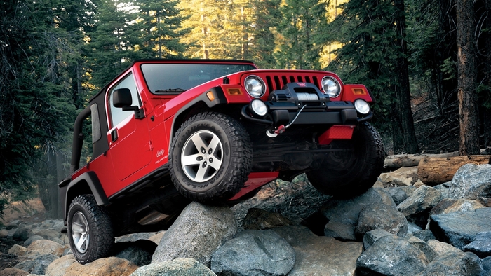 Jeep Off-Road Adventure in Forest Rocks