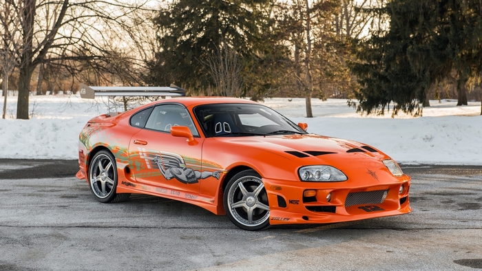Toyota Supra Orange Coupe with Racing Decals