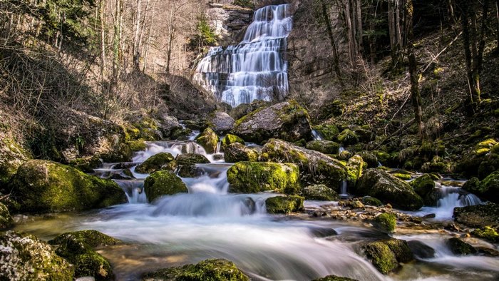 Waterfall in a rocky forest in France