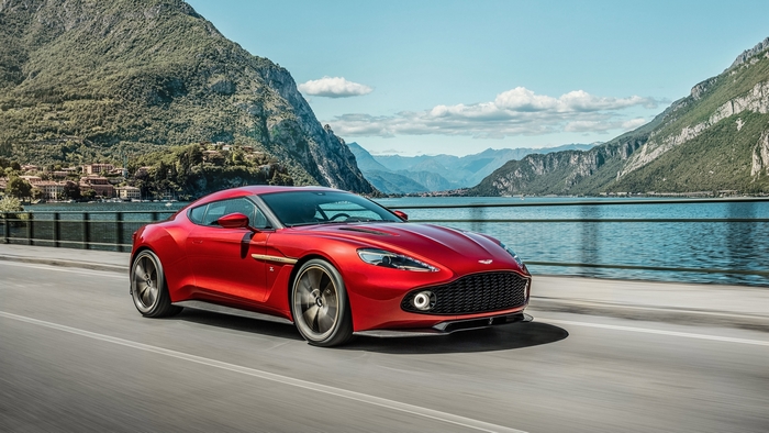 Aston Martin Vanquish Zagato driving by a lake
