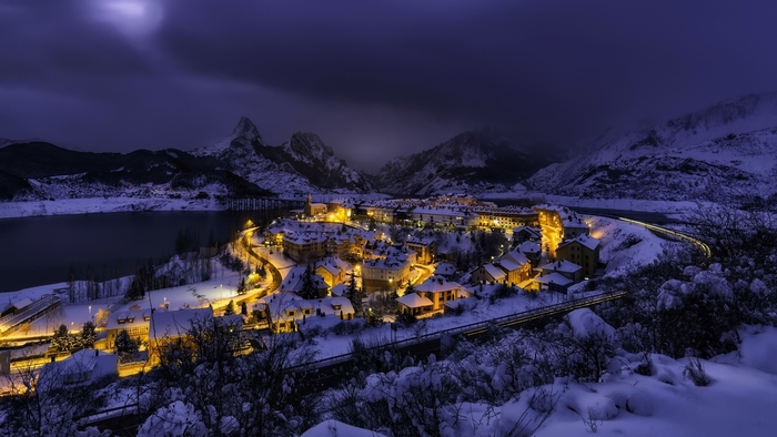 Snowy town at night in the mountains of Spain
