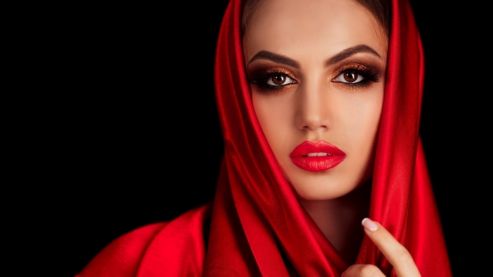 Woman with Red Shawl and Bold Makeup