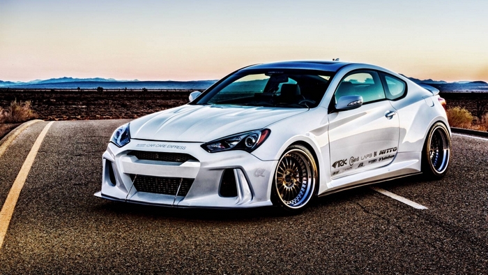 White Hyundai Genesis Coupe on a Desert Road