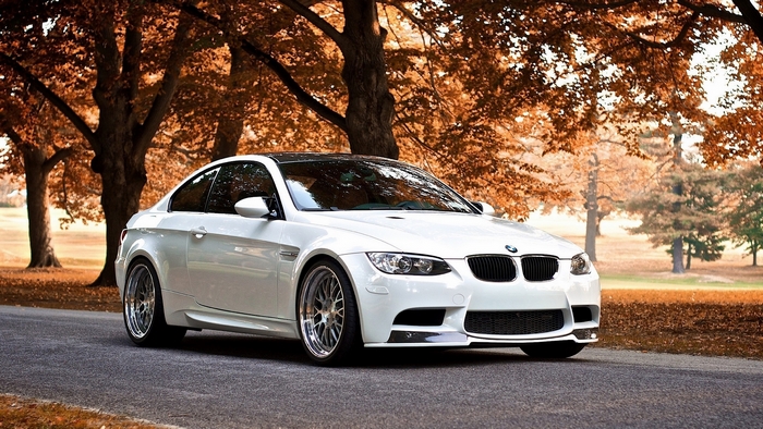 White BMW M3 Coupe on a Road in Autumn