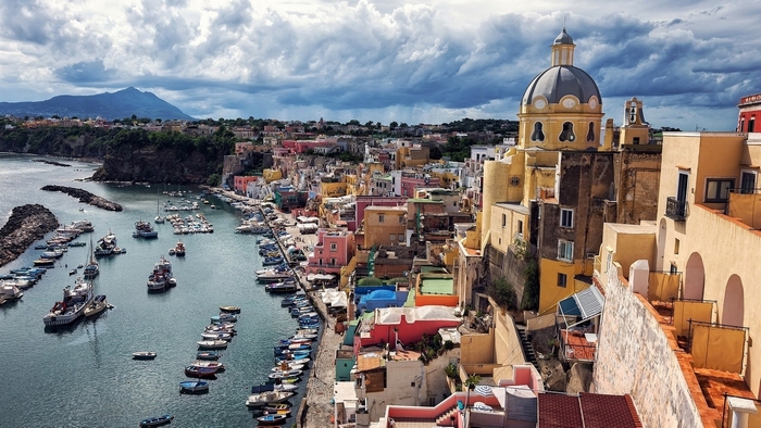 Colorful Italian coastal town with harbor and boats