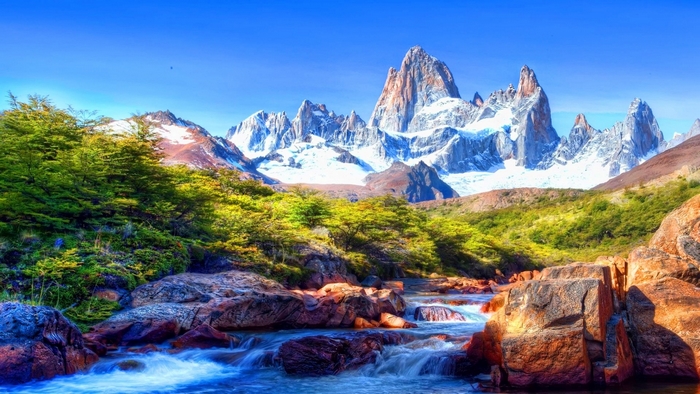 Snow-capped mountains and a river in Patagonia