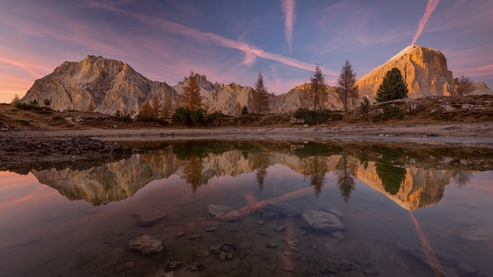 Mountain reflection in a lake at sunset