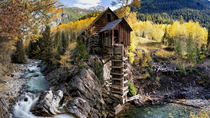 Crystal Mill in a forest with a river