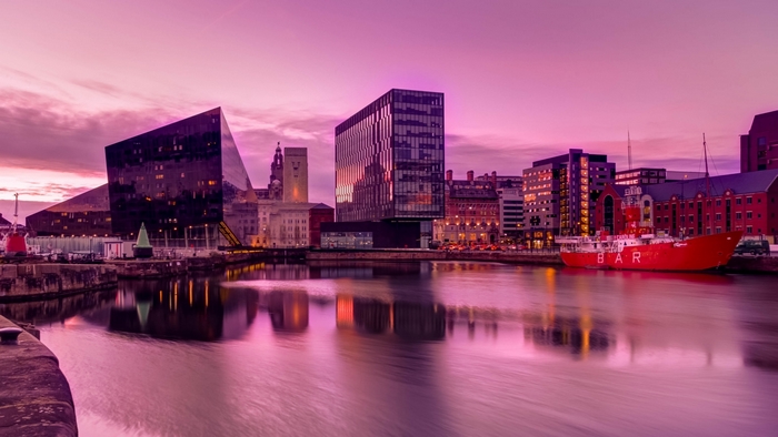 Liverpool waterfront at sunset with modern architecture
