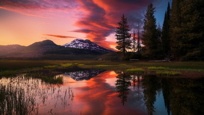 Sunset Reflections Over Mountain Lake