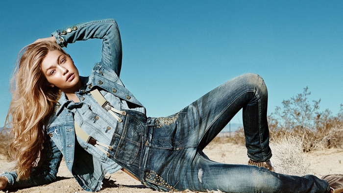 Stylish Woman in Denim Outfit in Desert Landscape