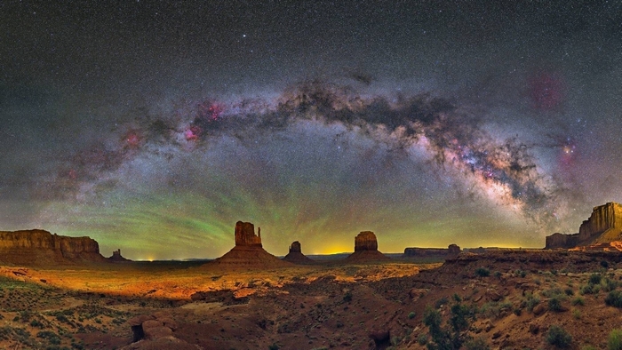 Milky Way Arching Over Monument Valley Desert