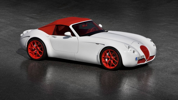 White Wiesmann GT with red accents and wheels