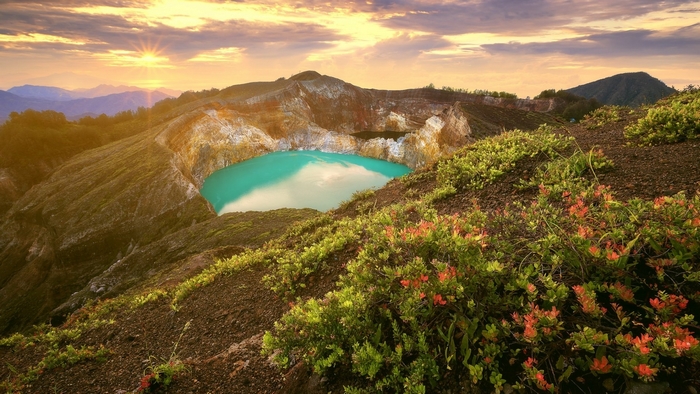 Sunlit Mountain Crater Lake in Spring