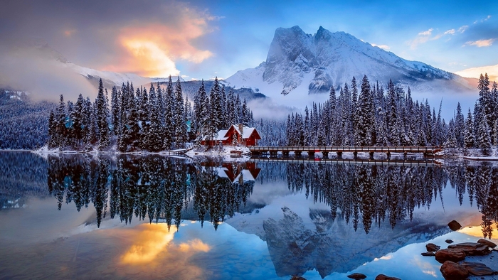 Winter Cabin by Snowy Mountain Lake