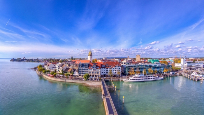 Town on the water with a bridge and boats