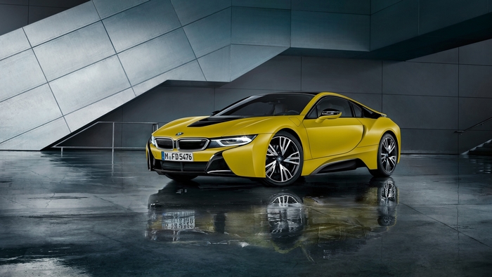 Yellow BMW i8 Sports Car in Studio with Reflections