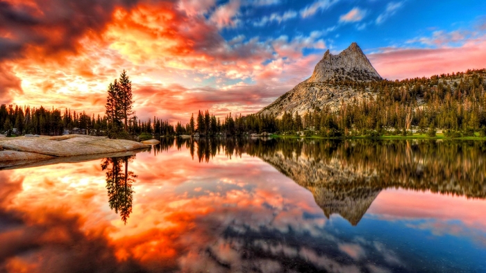 Fiery sunset over a mountain lake in Yosemite National Park