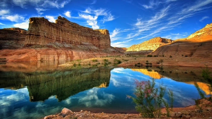 Desert canyon with lake and reflection